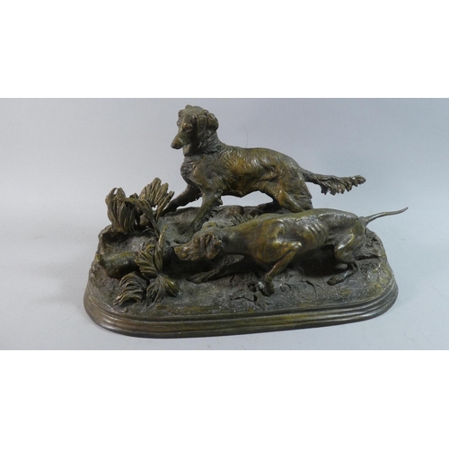 50 - A 19th Century French Patinated Bronze Animal Group depicting Pointer and Setter marking a Partridge... 