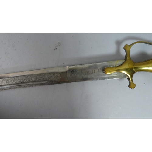 53 - A Brass Mounted Indian Cutlass with Engraved Blade and Brass Mounted Scabbard, Total Length 97cm