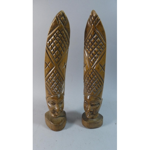 56 - A Pair of Carved Wooden African Tribal Busts of Gent and Lady with Extended Hats, Each 38cm high