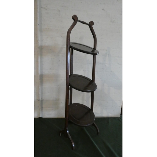 66 - An Edwardian Mahogany Three Tier Cake Stand, 88.5cm High