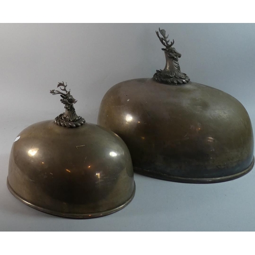 69 - An Impressive Graduated Pair of Silver Plated Oval Meat Covers with Finials in the form of Stags Hea... 