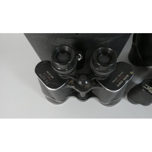 71 - Two Pairs of Cased Binoculars