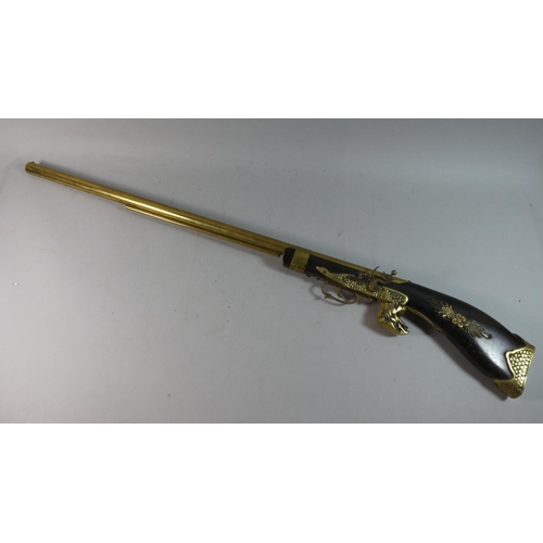 84 - A Brass Mounted Wall Hanging Model of a Flintlock Rifle, 105cm Long