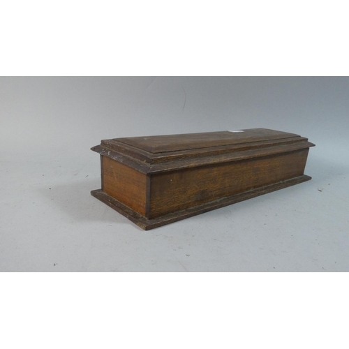 9 - A Late 19th Century Sarcophagus Shaped Oak Box