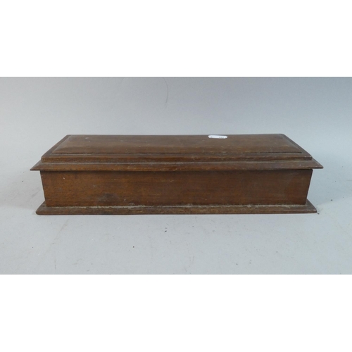 9 - A Late 19th Century Sarcophagus Shaped Oak Box