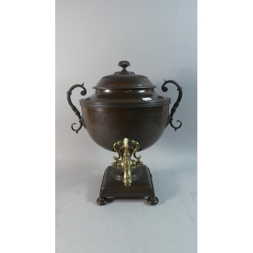 19 - A Victorian Copper Two Handled Vase Shaped Samovar with Brass Tap, 41cm High