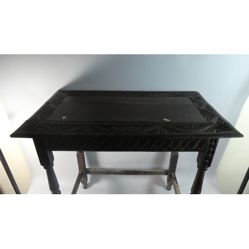 20 - An Edwardian Carved Oak Rectangular Table, 77cm Wide