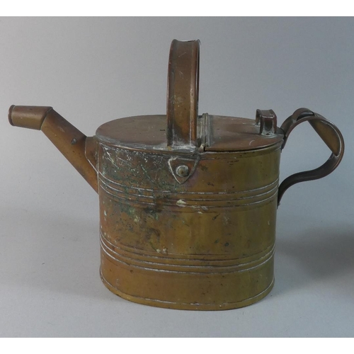 64 - A Pair of Brass Army and Navy Watering Cans