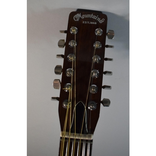 12 - A 1970s CF Mountain Japanese 'Lawsuit' 12 String Acoustic Guitar, Model W120-12.
Please note there i...