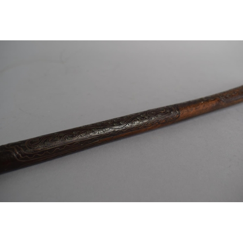 41 - A 19th Century Wire Inlaid North Indian or Persian Wooden Spoon, 43cm Long