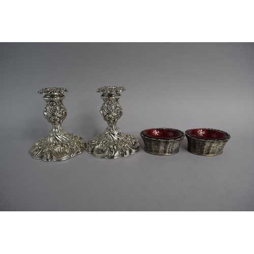 132 - A Pair of Silver Plated Rococo Style Candlesticks Together with a Pair of Silver Plated Salts in the... 