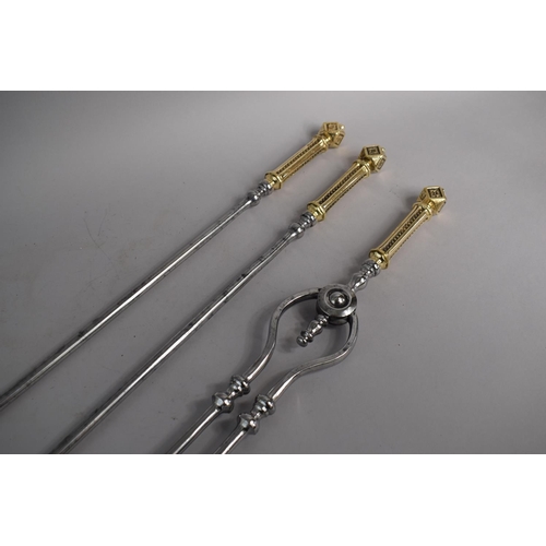 103 - A Set of Three 19th Century Polished Steel Fire Irons with Cube Topped Brass Handles, Pierced Shovel... 