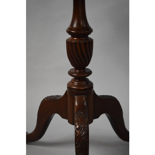 64 - A Reproduction Circular Mahogany Tripod Table with Spindle Gallery and CLaw and Ball Feet. 46cms Dia... 