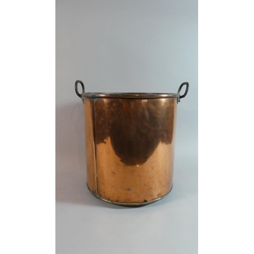 89 - A Late 19th Century Copper Cooking Pot with Iron Handles, 26cm Diameter and 31cm High