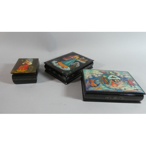 216 - A Collection of Three Russian Lacquered Boxes, The Lids Decorated with Fairy Tale Scenes, Largest 14... 