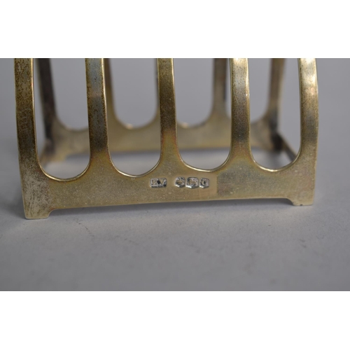 179 - A Small Silver Four Piece Toast Rack. Sheffield 1920