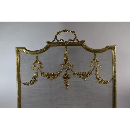 108 - A French Brass and wire Fire Screen Decorated with Foliate Swags and Ribbons on Scrolled Feet, 63cm ... 