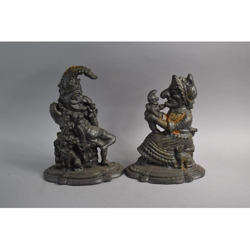 99 - A Pair of Cast Metal Punch and Judy Door Stops, 31cm High