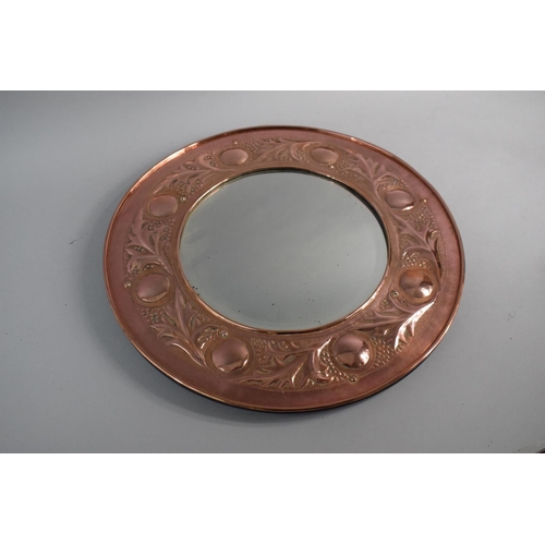 92 - A Keswick School of Industrial Art Circular Copper Framed Mirror with Rounded and Foliate Decoration... 