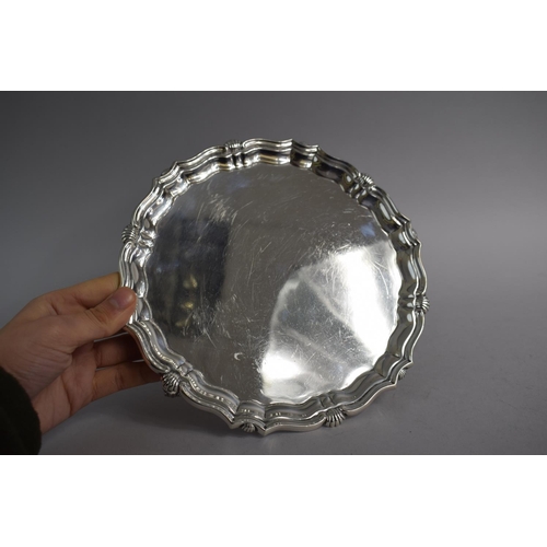 183 - A Silver Card Tray on Three Scrolled Feet, Sheffield 1926. 20cms Diameter. 420gms