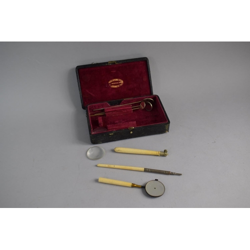 25 - A Late 19th /Early 20th Century Ivory Handled Dentist's Ophthalmoscope and Collection of Dentistry M... 