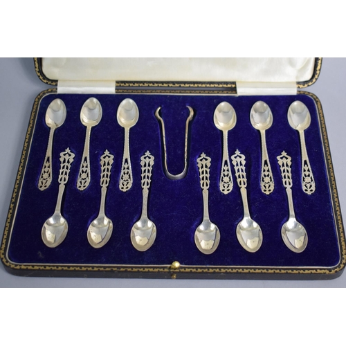 145 - A Cased Set of Twelve Silver Coffee Spoons with Pierced Handles and a Matching Sugar Bow, Sheffield ... 