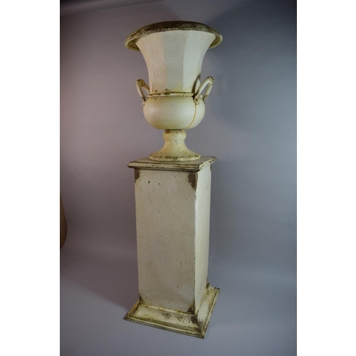 105 - A Painted Metal Classical Twin Handled Urn on Plinth. 95cms High