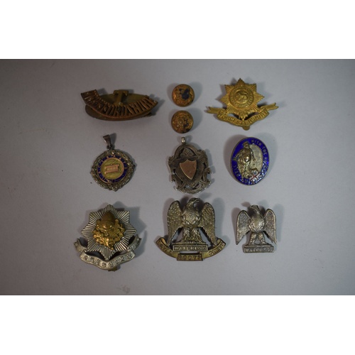 17 - A Collection of Five Military Badges, 