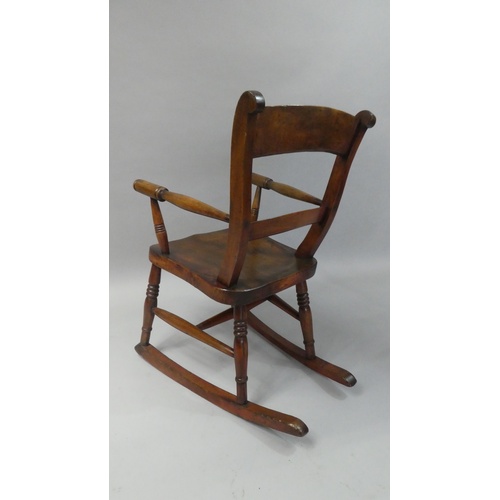 68 - A 19th Century Child's Rocking Chair Made from Beechwood with an Elm Seat, 68cm high