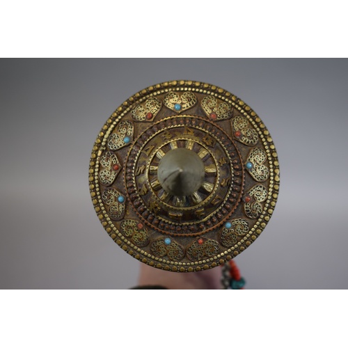 83 - A Tibetan Prayer Wheel with Turned Ebonised Handle, 37cm Long