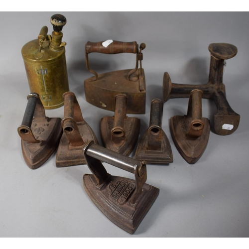 111 - A Vintage Brass Sprayer Together with Seven Vintage Flat Irons and a Shoe Last