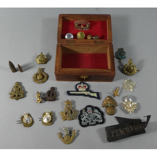 115 - A Far Eastern Wooden Box Containing Collection of Reproduction and Original Military Badges etc