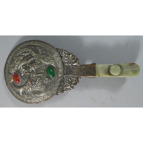 20 - A Reproduction Chinese Hand Mirror with Faux Jade Handle and Back Decorated with Dragons Chasing Fla... 