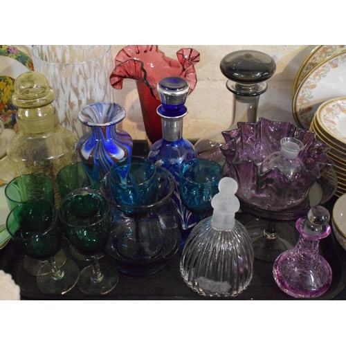 210 - A Tray of Coloured Glassware to Include Cranberry Glass Vase, Smoke Coloured Decanter, Goebel 1979 G... 