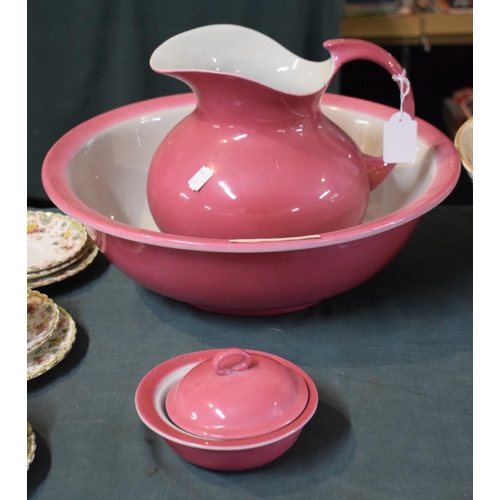 236 - A Pink Toilet Jug, Bowl and Soapdish