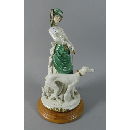 242 - An Italian Figural Ornament Maiden with Dog