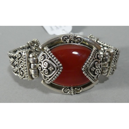 299 - A Ladies Silver Bracelet with Carnelian Cabochon, 58.2g