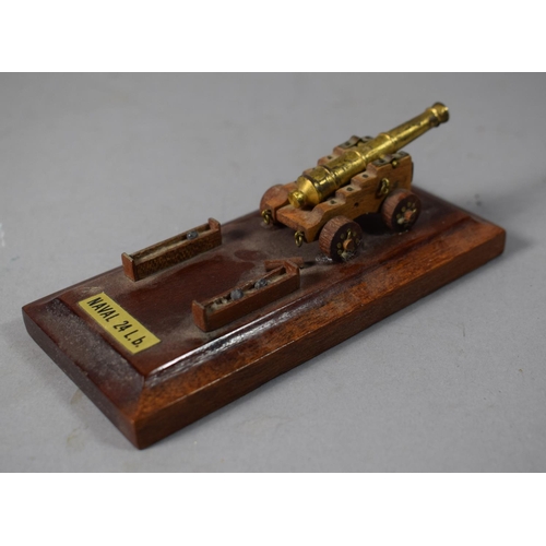 34 - A Small Military Ink Bottle Stand Depicting Naval 24lb Cannon, Missing Ink Bottle, 13cm Long