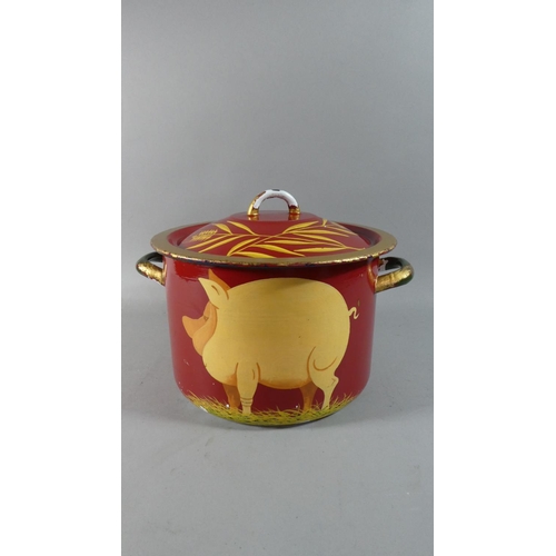 47 - An Enamelled Two Handled Cooking Pan Decorated with Pig, 23cm High