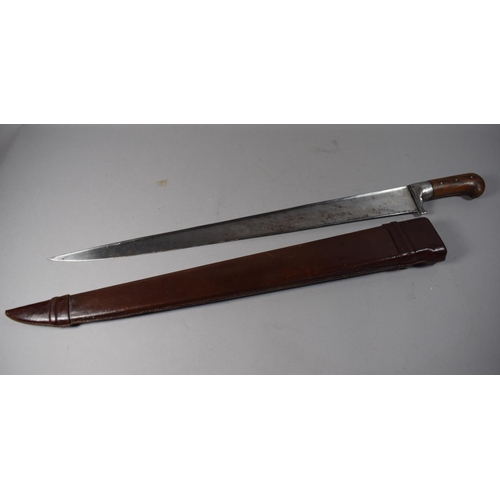 49 - A Vintage Wooden Handled Machete with Leather Scabbard, Blade 58.5cm Long