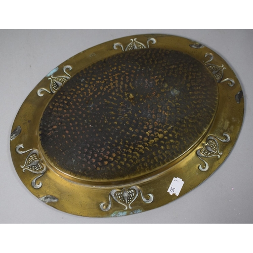 9 - A Pressed Brass Art Nouveau Oval Tray, 33.5cm Wide