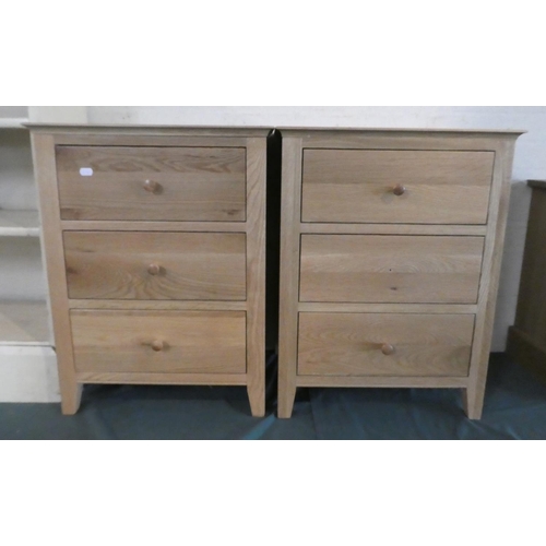 92 - A Pair of Light Oak Three Drawer Chests, Each 50cm Wide, One Drawer Missing Knob