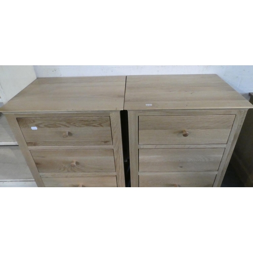 92 - A Pair of Light Oak Three Drawer Chests, Each 50cm Wide, One Drawer Missing Knob