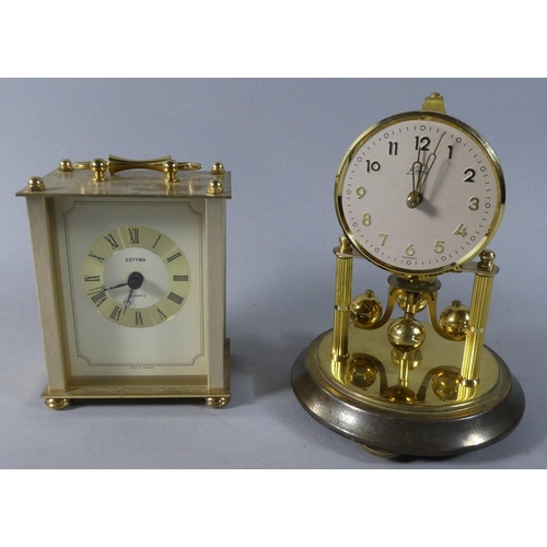 94 - A Small Pillar Clock and an Estyma Carriage Clock with Battery Movement