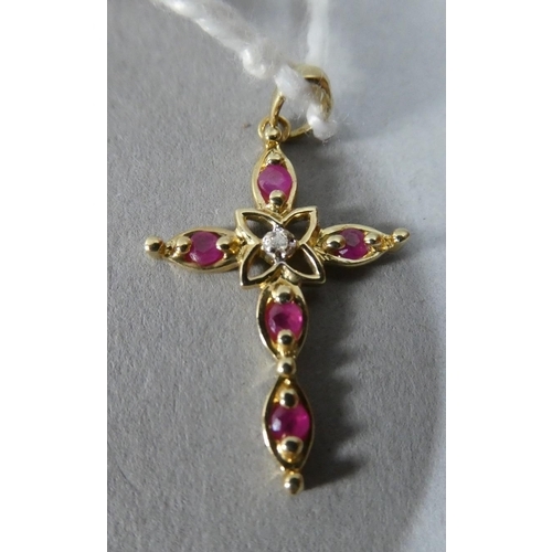 269 - A 9ct Gold Crucifix with Rubies and Central Diamond, 1g