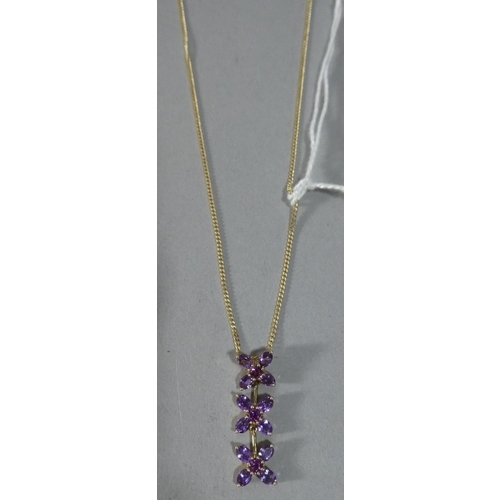 271 - A 9ct Gold Necklace with Pendant Having Tanzanite Floral Dropper, 4.8g