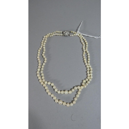 296 - A Two String Pearl Necklace with Silver Clasp