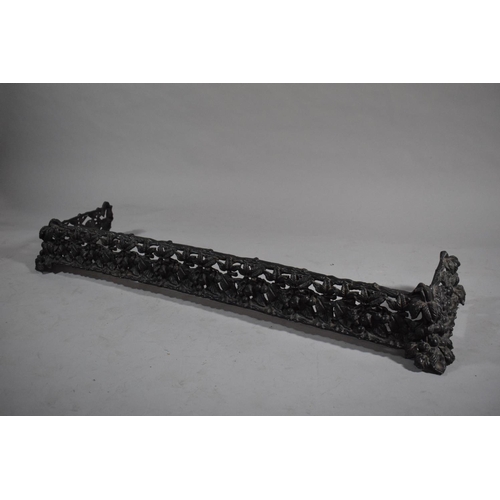 98 - A Cast Iron Pierced Fire Kerb Decorated with Cherries, 120cms Wide