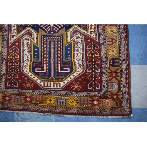 80 - An Antique Hand-Made Kazak Rug, 172 x 112cms