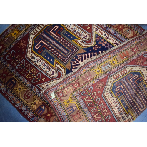 80 - An Antique Hand-Made Kazak Rug, 172 x 112cms